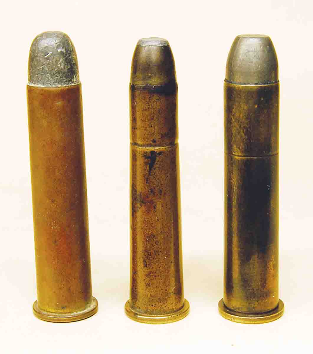 The Marlin M1881 was designed to fire the original .45-70-405 Govt. round (left), which is why the .40-60-260 Marlin (center) was made the length it was. Cartridge detonations in the magazine caused Marlin to require a special .45-70-405 Marlin round (right) that had a flatnose bullet.